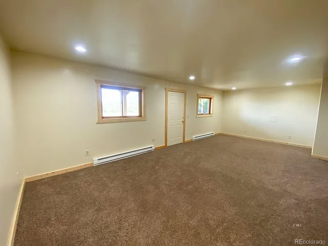 a house with trees in the background