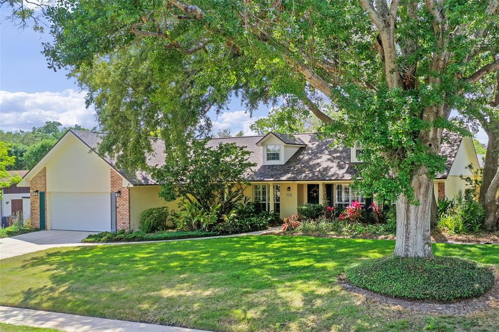 1440 Suzanne Way Longwood, FL 32779 - Photo 1 of 1 a front view of house with a garden