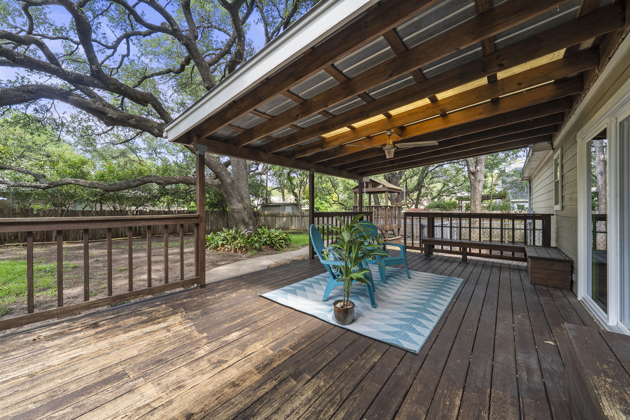 11405 Pyreneese Drive Austin, TX 78759 - Photo 36 of 37 a view of a deck with furniture and wooden floor