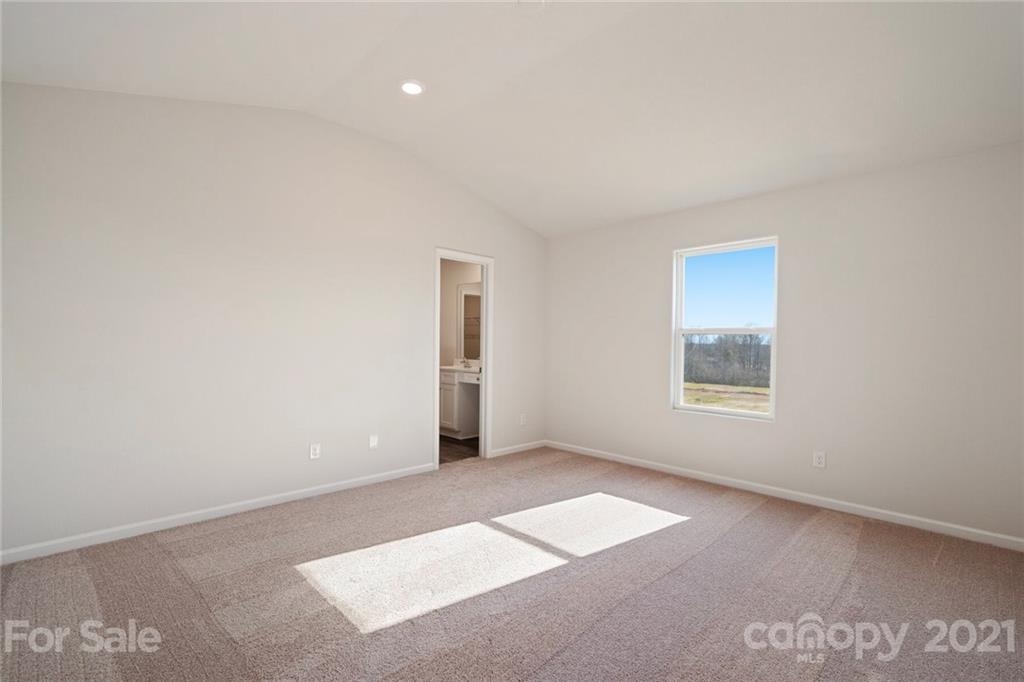 2106 Osten Run Monroe, NC 28110 - Photo 6 of 7 a view of an empty room with a window
