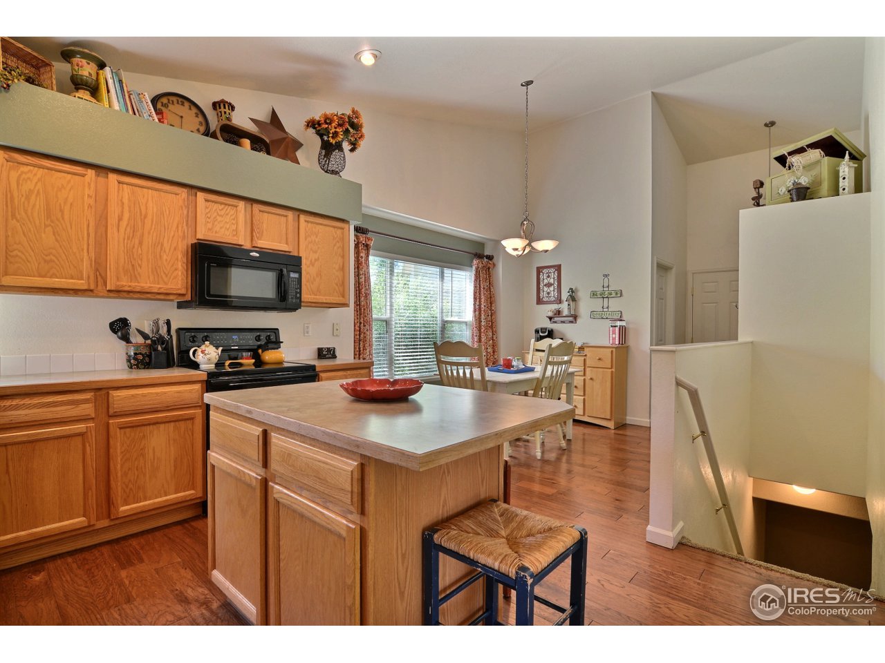 1345 Black Hawk Road Eaton, CO 80615 - Photo 12 of 34 Kitchen Island