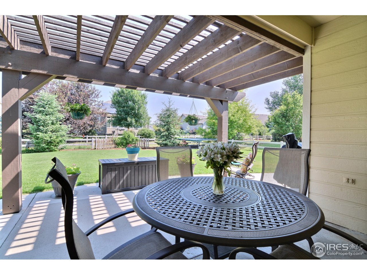 1345 Black Hawk Road Eaton, CO 80615 - Photo 30 of 34 Pergola Covered Patio
