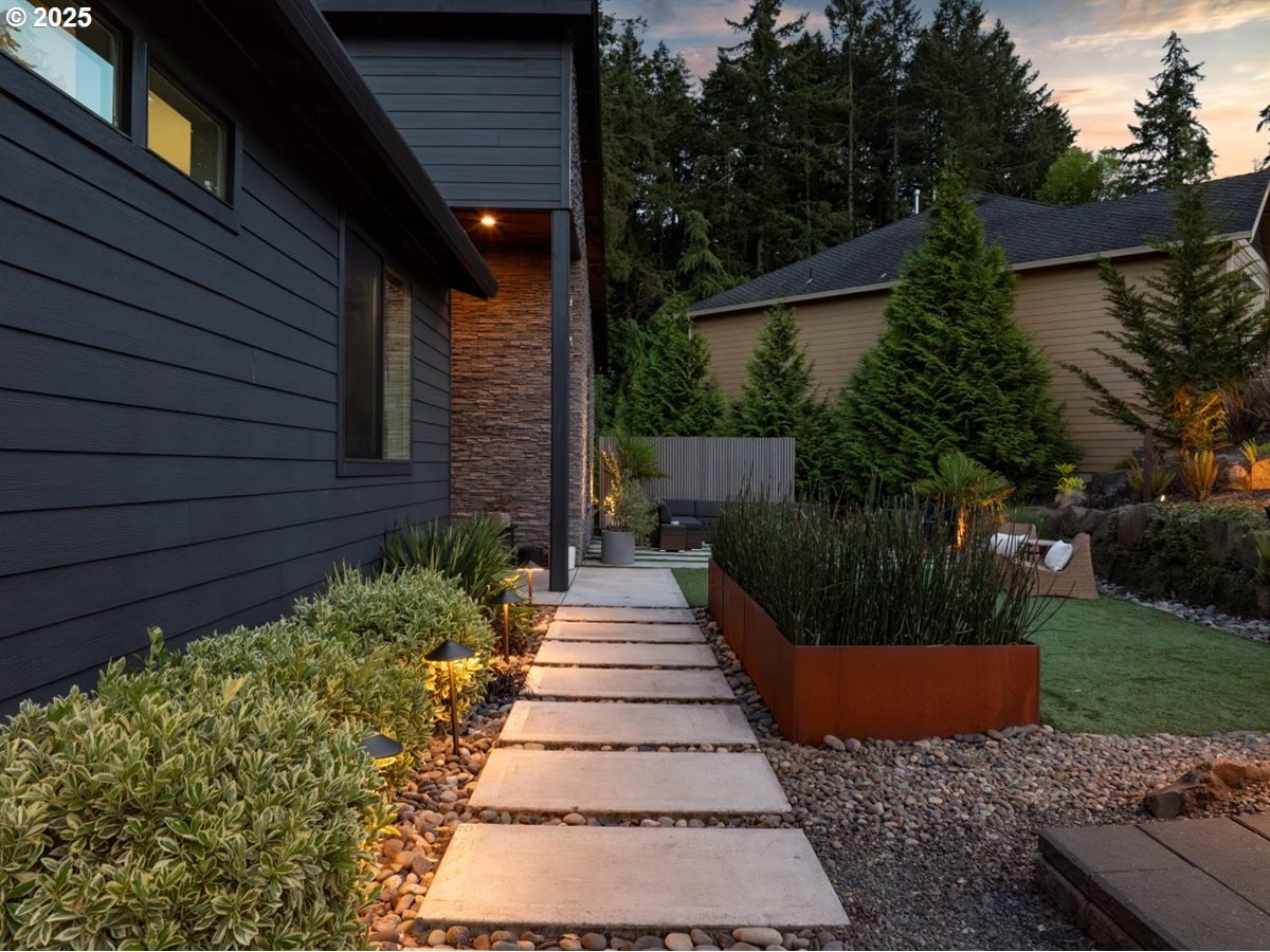 720 South 19th Place Ridgefield, WA 98642 - Photo 2 of 48 a view of a pathway both side of house
