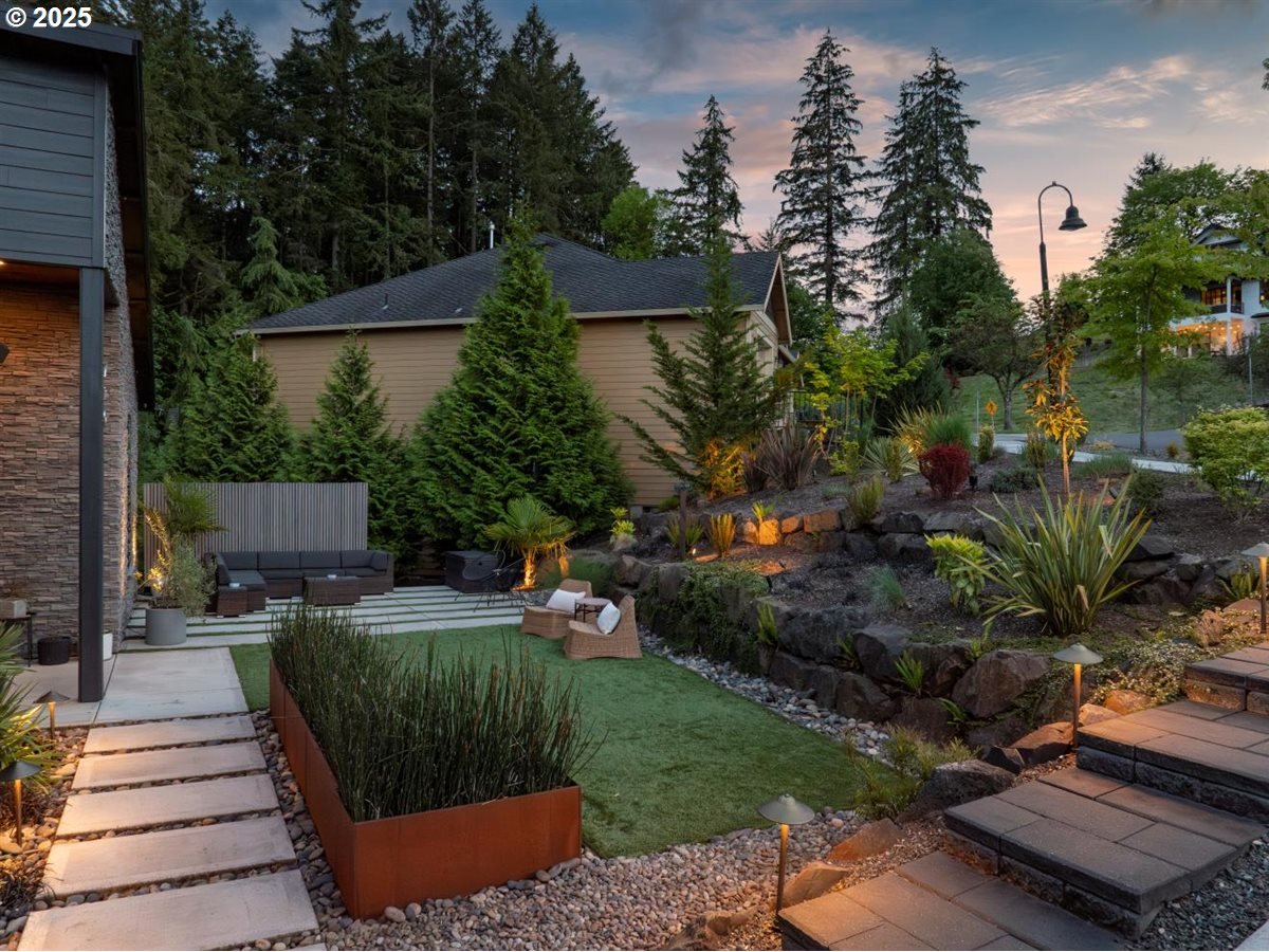 720 South 19th Place Ridgefield, WA 98642 - Photo 3 of 48 a view of a backyard with sitting area