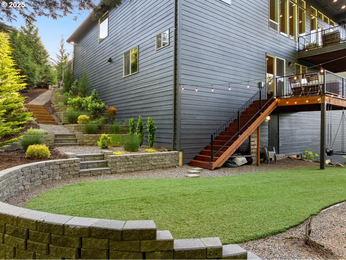720 South 19th Place Ridgefield, WA 98642 - Photo 45 of 48 a view of a house with a backyard