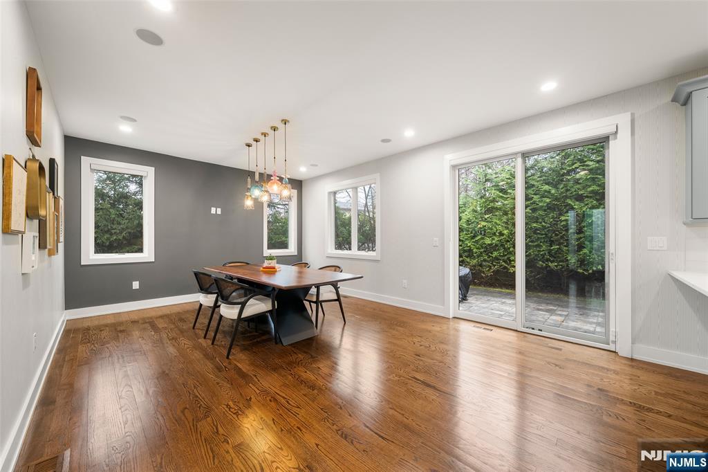 55 Cedar Street Cresskill, NJ 07626 - Photo 11 of 40 a view of a dining room with furniture window and wooden floor