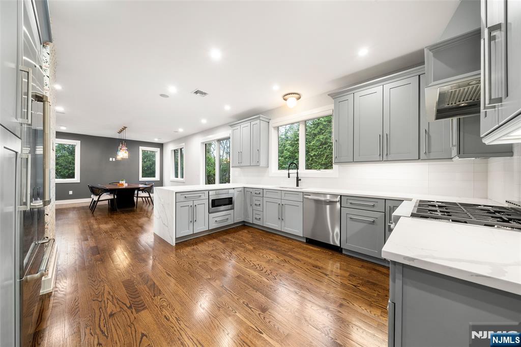 55 Cedar Street Cresskill, NJ 07626 - Photo 15 of 40 a large white kitchen with a large window
