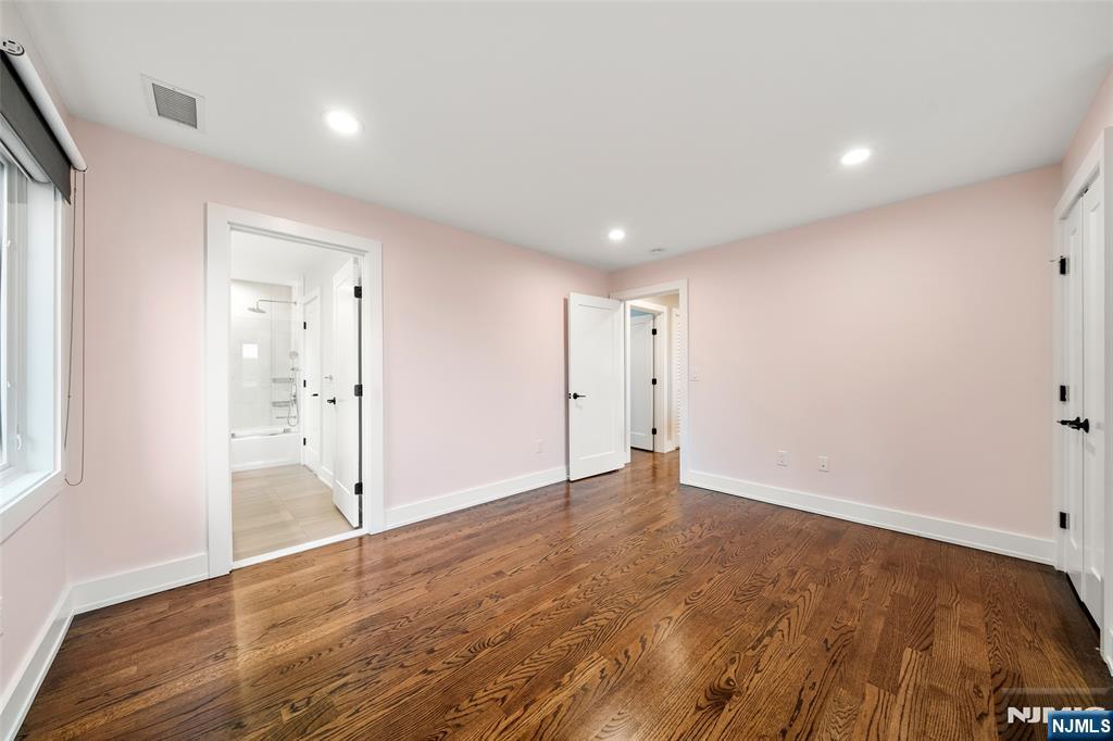 55 Cedar Street Cresskill, NJ 07626 - Photo 31 of 40 wooden floor in an empty room with a window