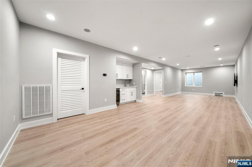 55 Cedar Street Cresskill, NJ 07626 - Photo 34 of 40 a view of empty room with wooden floor