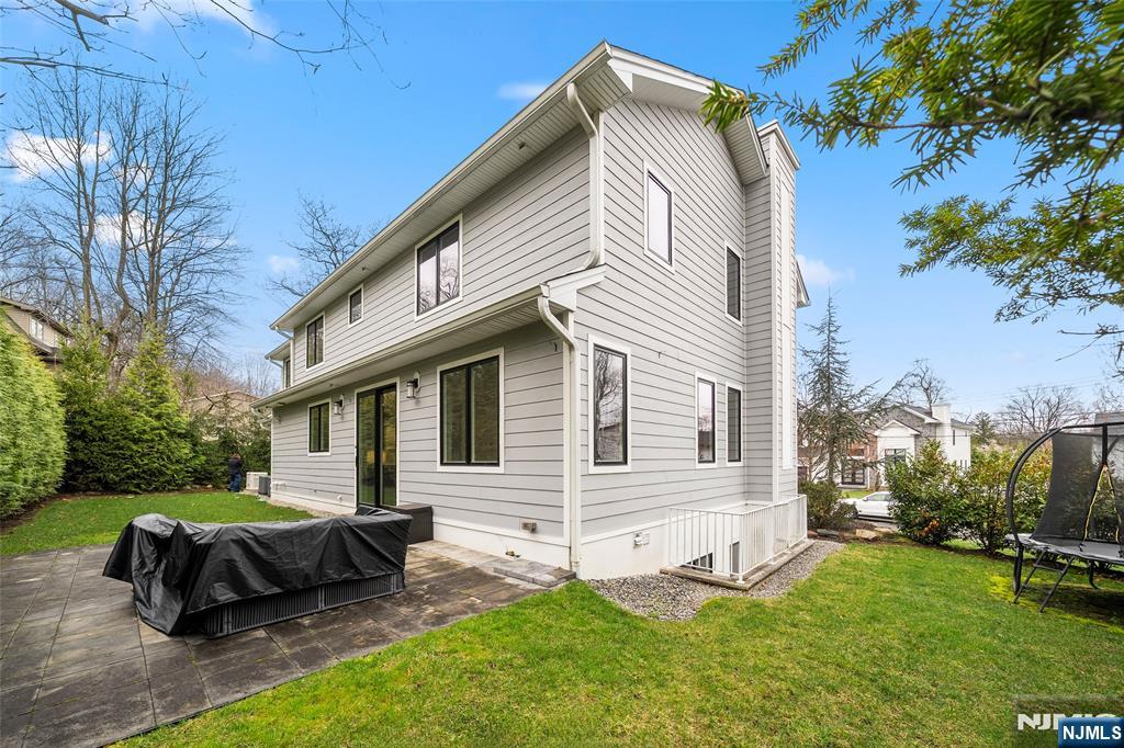 55 Cedar Street Cresskill, NJ 07626 - Photo 40 of 40 a view of a house with backyard and sitting area