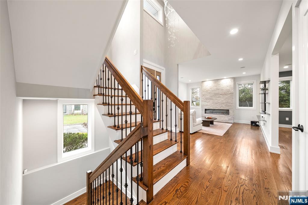 55 Cedar Street Cresskill, NJ 07626 - Photo 7 of 40 a view of an entryway with wooden floor and stairs