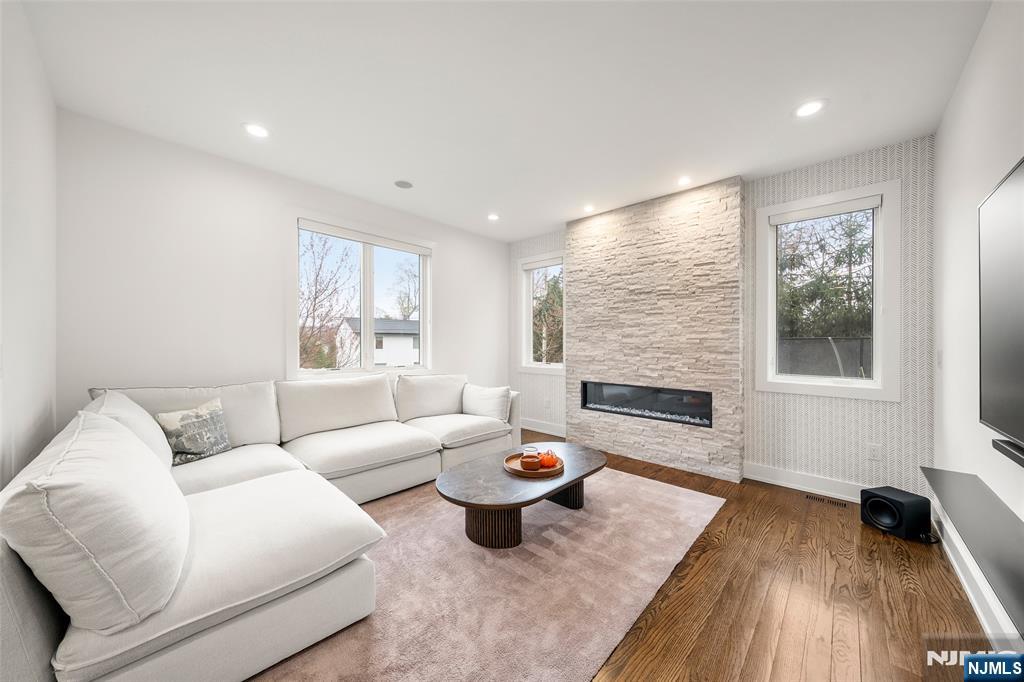 55 Cedar Street Cresskill, NJ 07626 - Photo 8 of 40 a living room with furniture and a large window