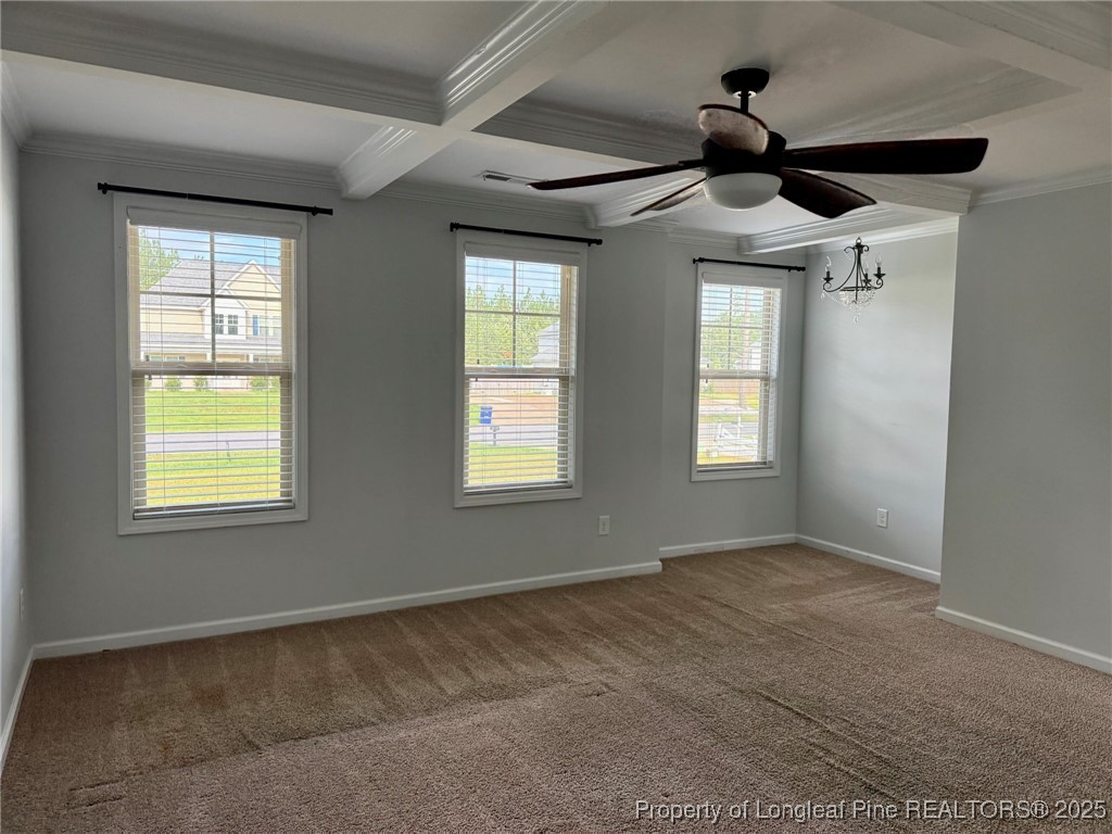 512 Townsend Road Raeford, NC 28376 - Photo 16 of 20 an empty room with windows and ceiling fan
