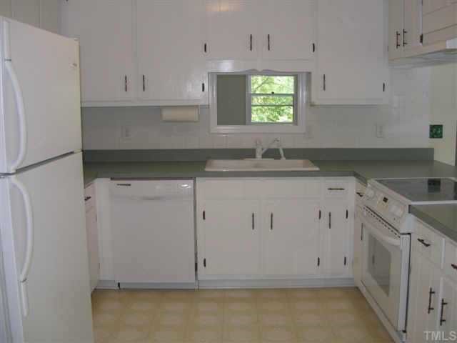 1028 Bahama Road Bahama, NC 27503 - Photo 7 of 10 The Kitchen is open with lots of cabinet space. There is a large Pantry which you will like.