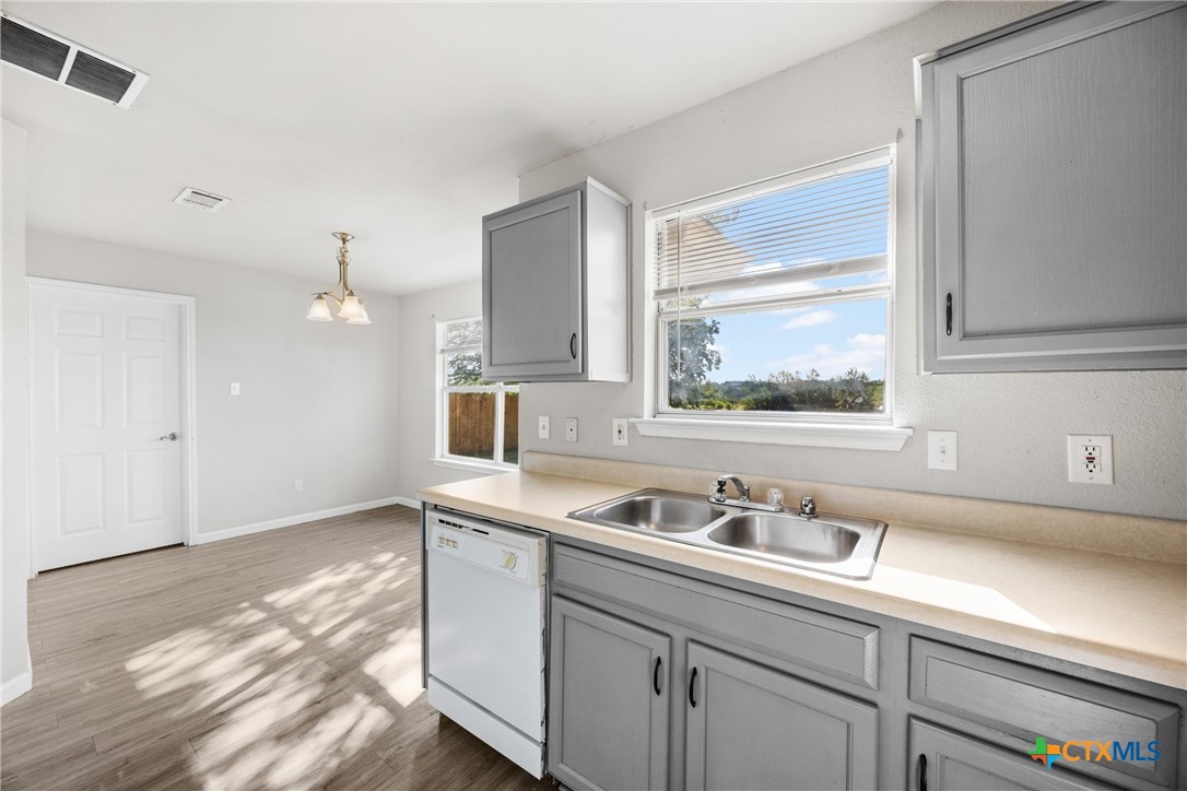 2117 Schwald Road Killeen, TX 76543 - Photo 11 of 29 a kitchen with a sink cabinets and window