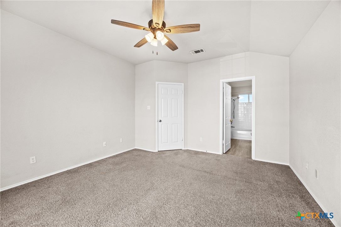 2117 Schwald Road Killeen, TX 76543 - Photo 16 of 29 an empty room with chandelier fan