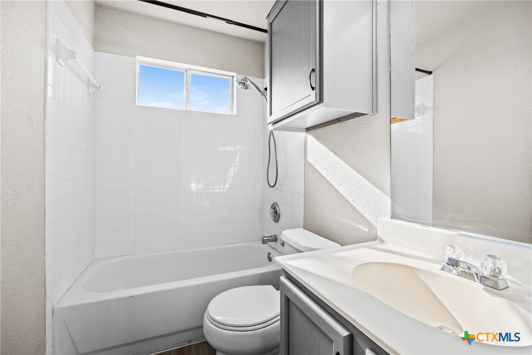 2117 Schwald Road Killeen, TX 76543 - Photo 20 of 29 a bathroom with a sink a toilet and a bathtub