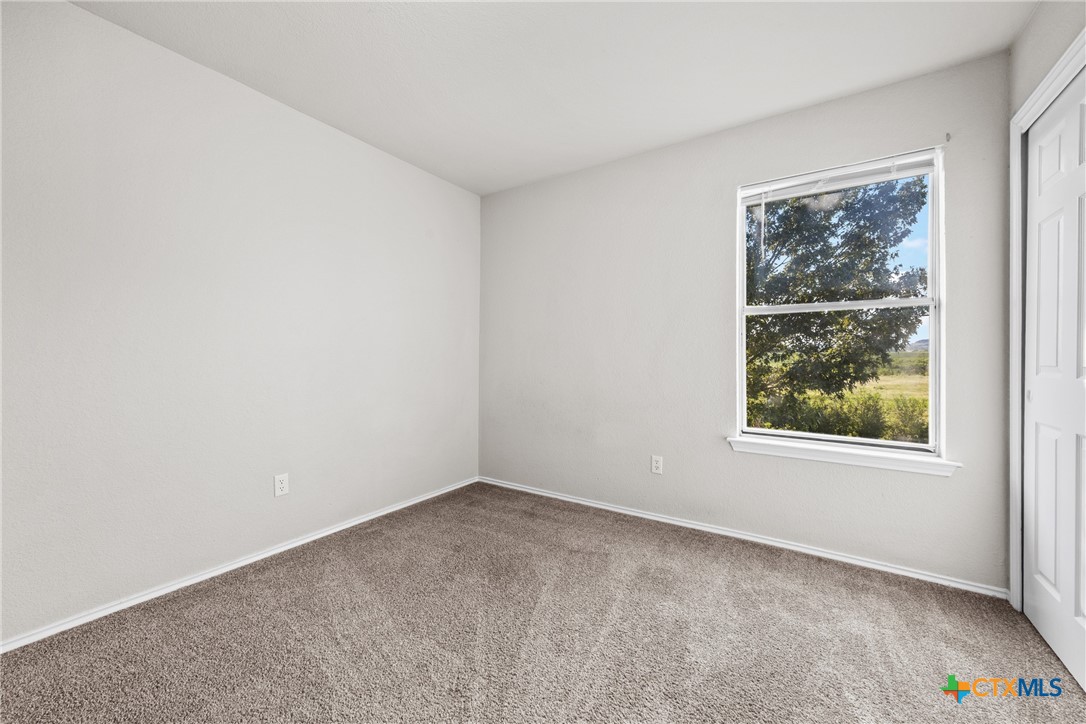 2117 Schwald Road Killeen, TX 76543 - Photo 22 of 29 an empty room with windows