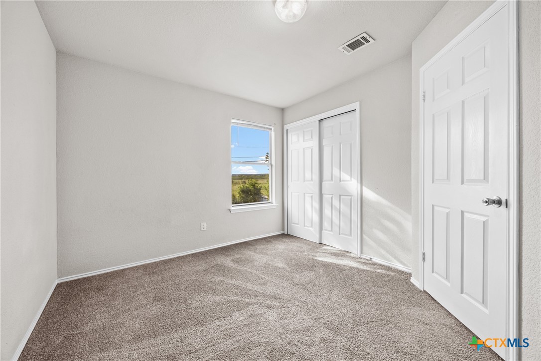 2117 Schwald Road Killeen, TX 76543 - Photo 23 of 29 an empty room with windows