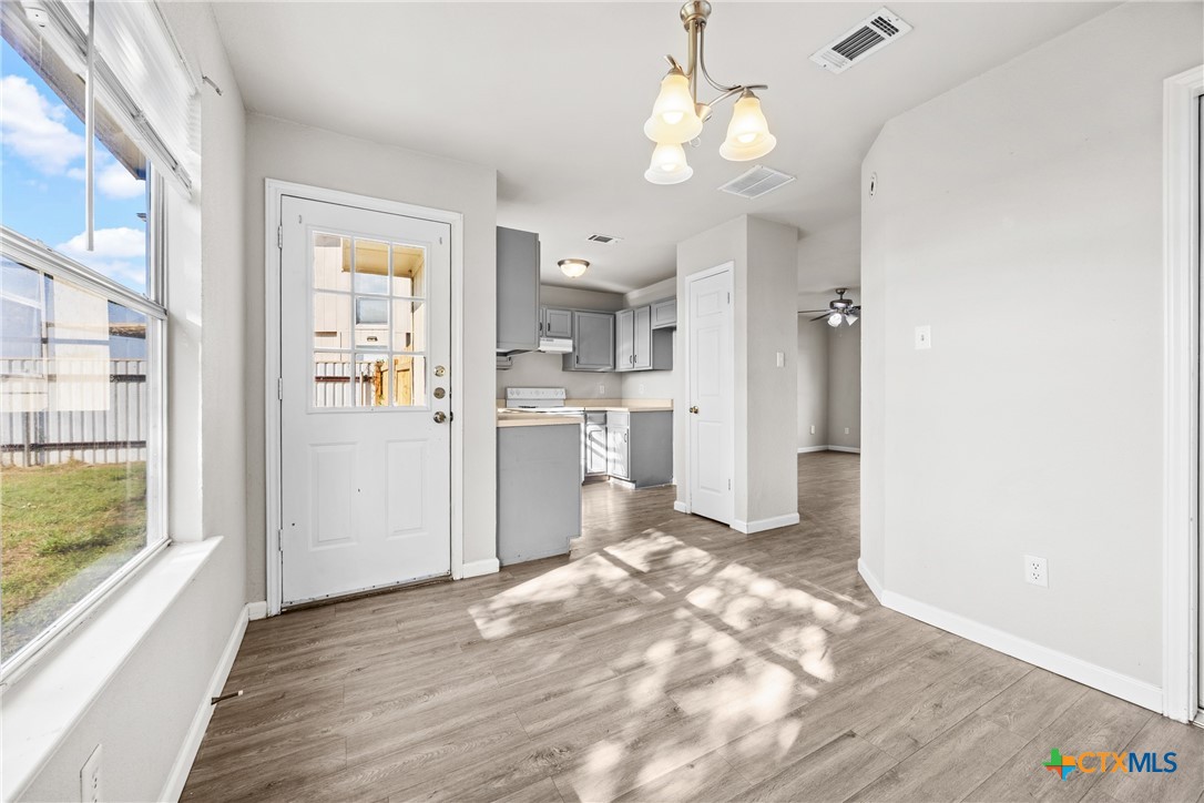 2117 Schwald Road Killeen, TX 76543 - Photo 9 of 29 a view of a kitchen from the hallway with a window
