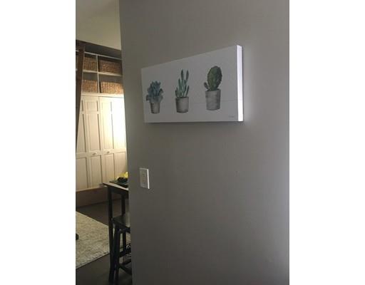 5 Coburn Avenue Worcester, MA 01604 - Photo 14 of 20 a view of a hallway with a white walls