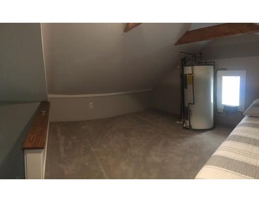 5 Coburn Avenue Worcester, MA 01604 - Photo 20 of 20 a open area with a cabinet and mirror