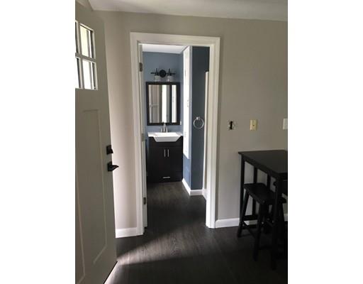 5 Coburn Avenue Worcester, MA 01604 - Photo 5 of 20 a en suite bathroom with a sink and a mirror