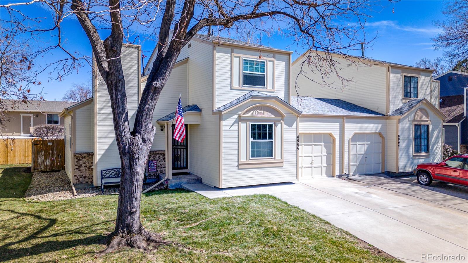 a view of a house with a yard