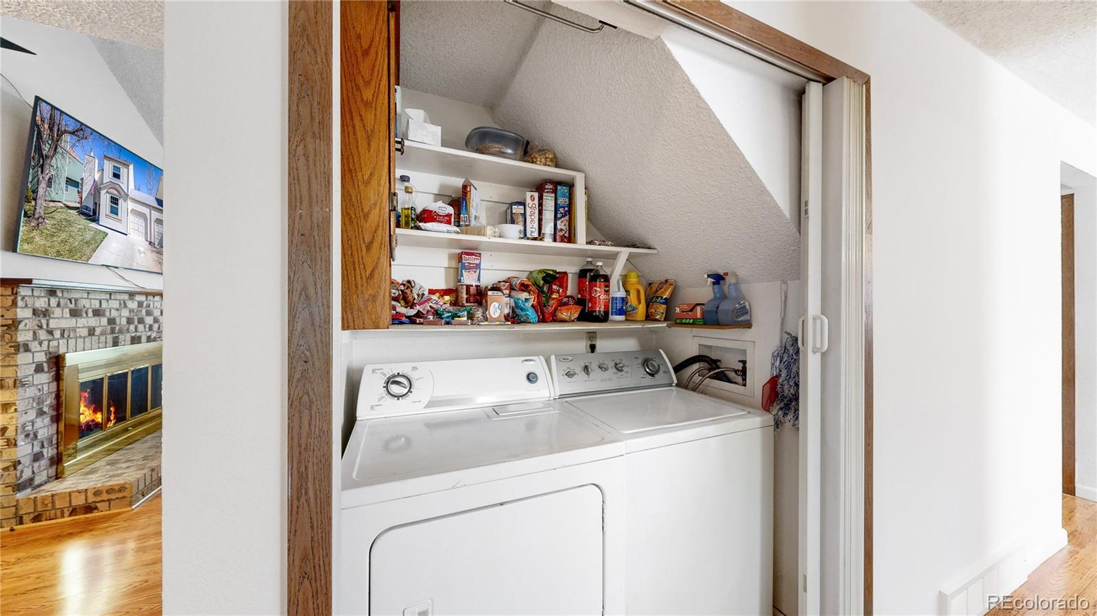 8906 Everett Street Broomfield, CO 80021 - Photo 12 of 35 a utility room with dryer and washer