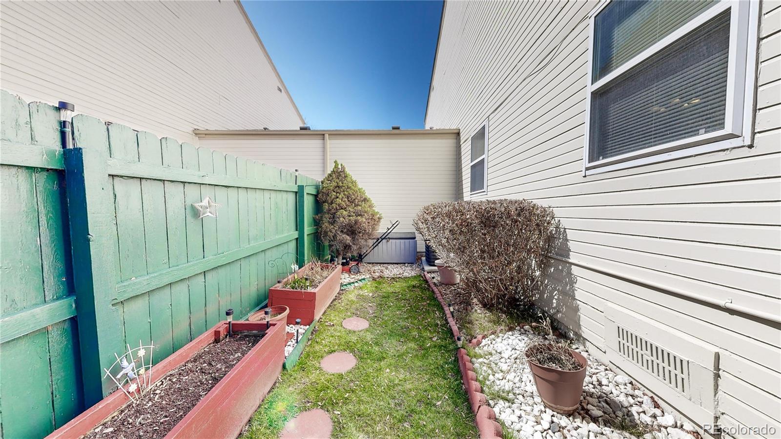 8906 Everett Street Broomfield, CO 80021 - Photo 24 of 35 a balcony view with couple of flower plant