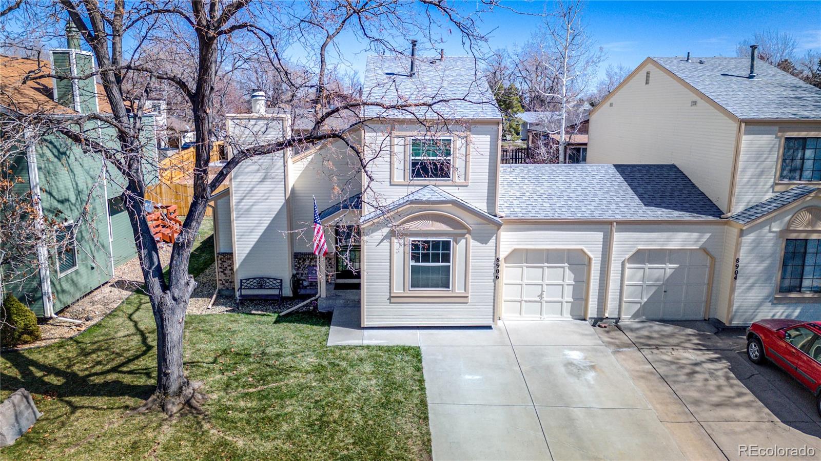 8906 Everett Street Broomfield, CO 80021 - Photo 27 of 35 a front view of a house with a yard