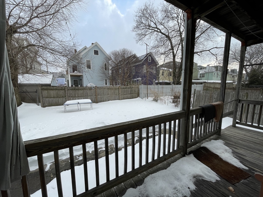 26-28 Adrian Street Somerville, MA 02143 - Photo 18 of 32 a view of a balcony with furniture