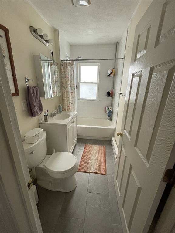 26-28 Adrian Street Somerville, MA 02143 - Photo 27 of 32 a bathroom with sink toilet and shower