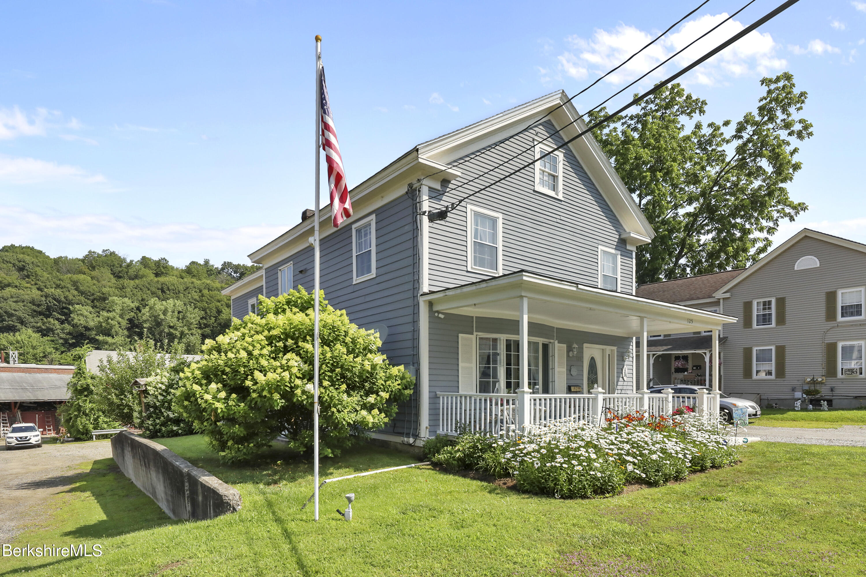 a house view with a garden space