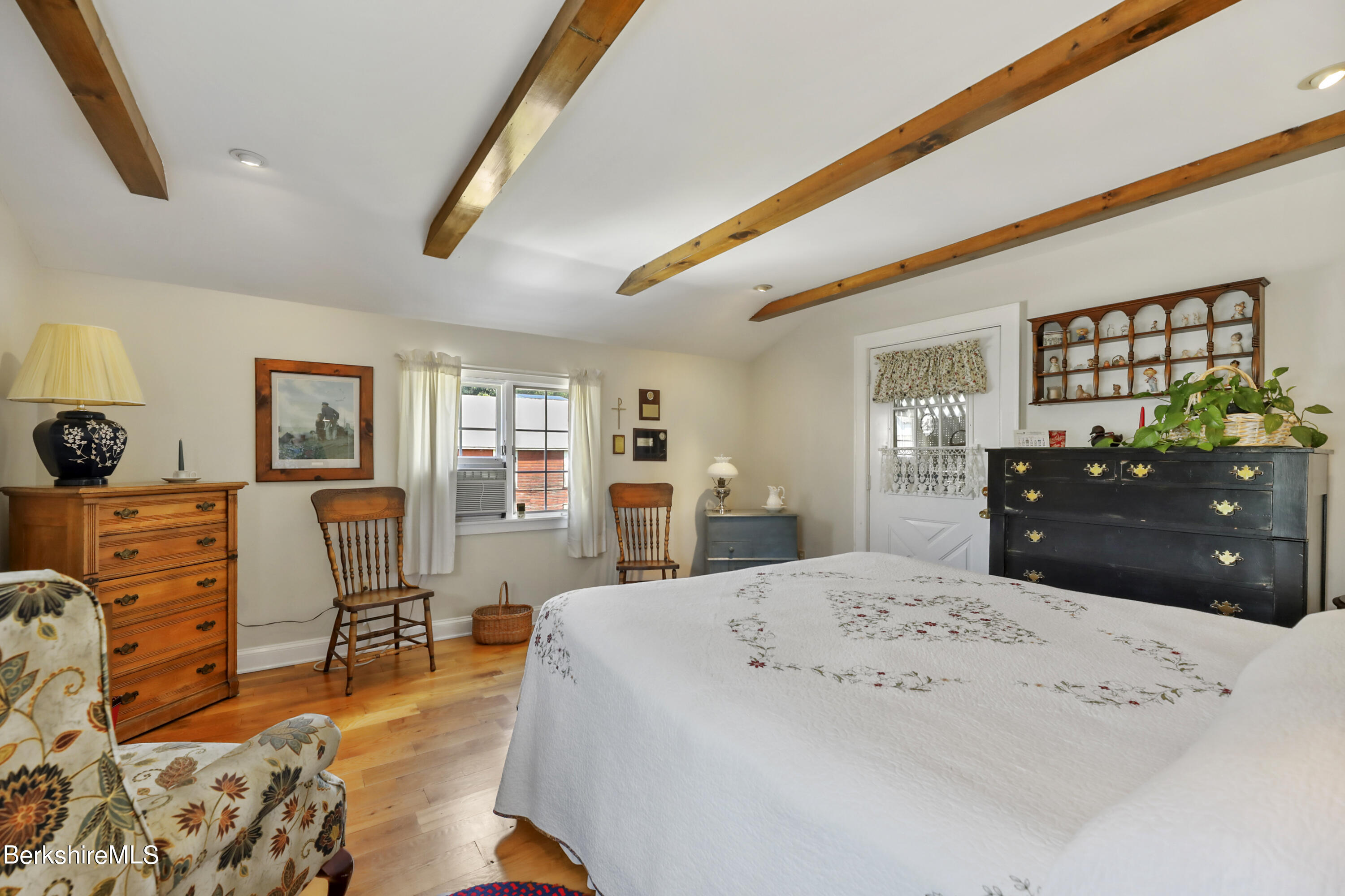 125 Center Street, Unit 2 Lee, MA 01238 - Photo 18 of 39 a living room with furniture and wooden floor