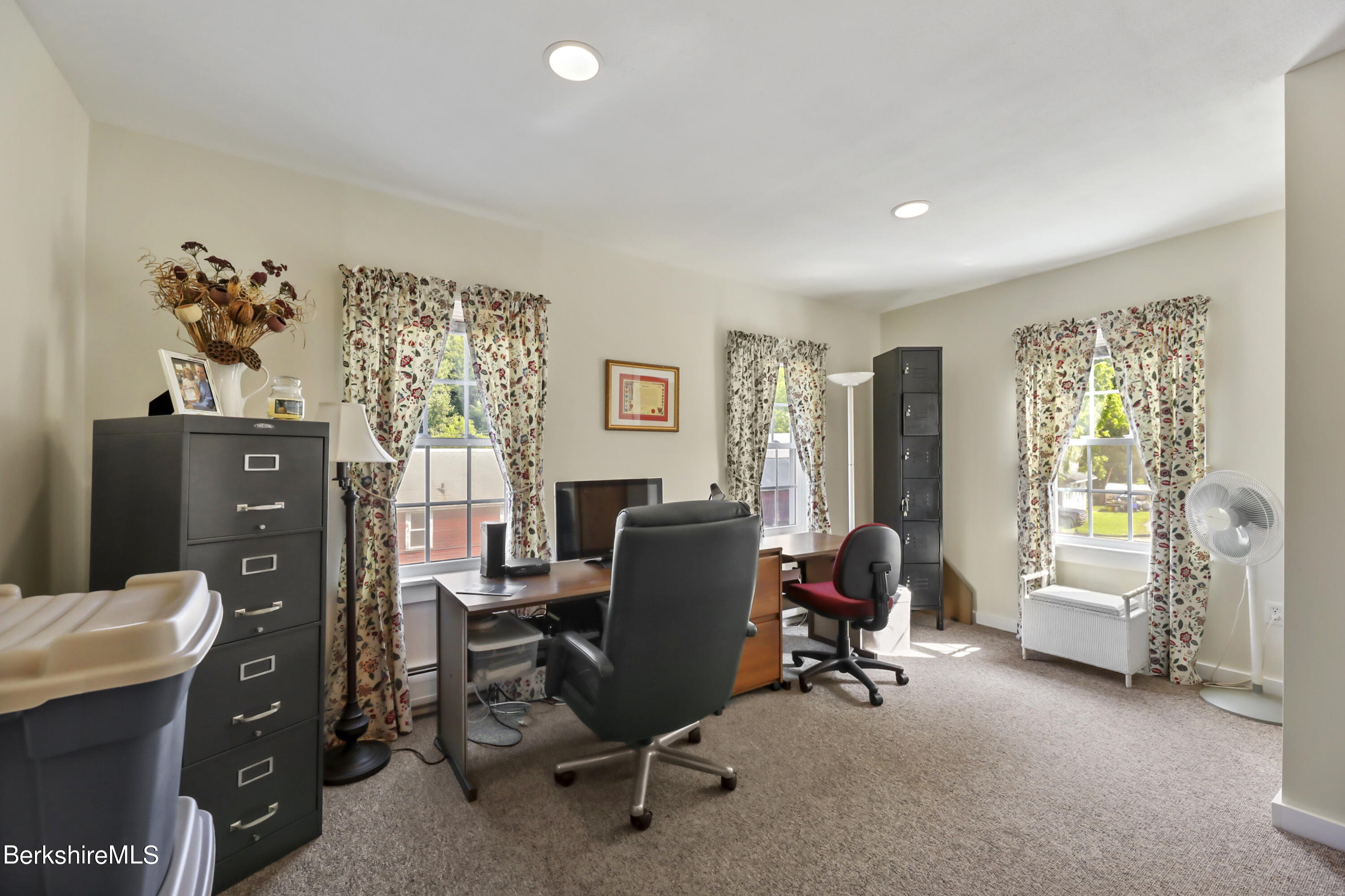 125 Center Street, Unit 2 Lee, MA 01238 - Photo 21 of 39 a view of a workspace with furniture and a window