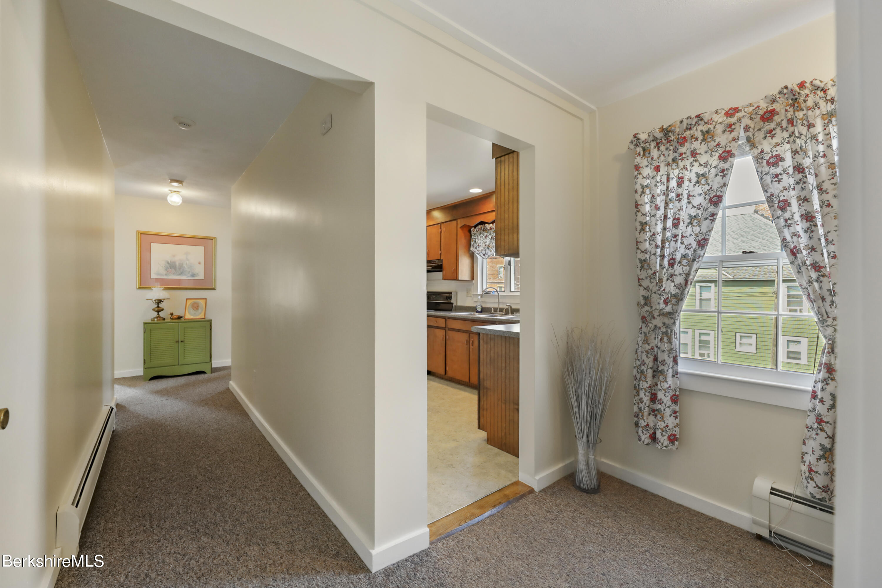 125 Center Street, Unit 2 Lee, MA 01238 - Photo 23 of 39 a view of hallway with living room and a window