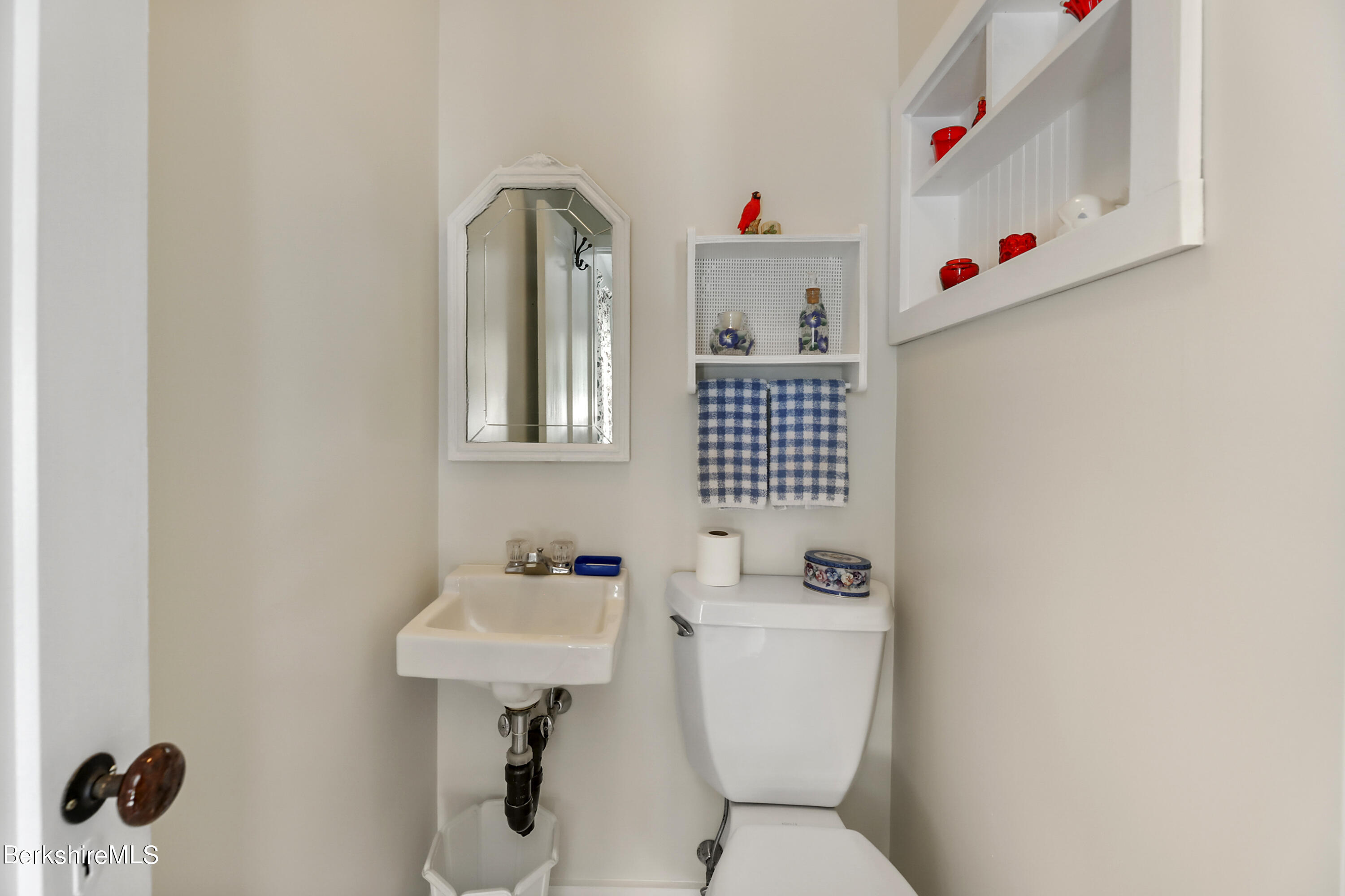 125 Center Street, Unit 2 Lee, MA 01238 - Photo 29 of 39 a bathroom with a sink toilet and a mirror