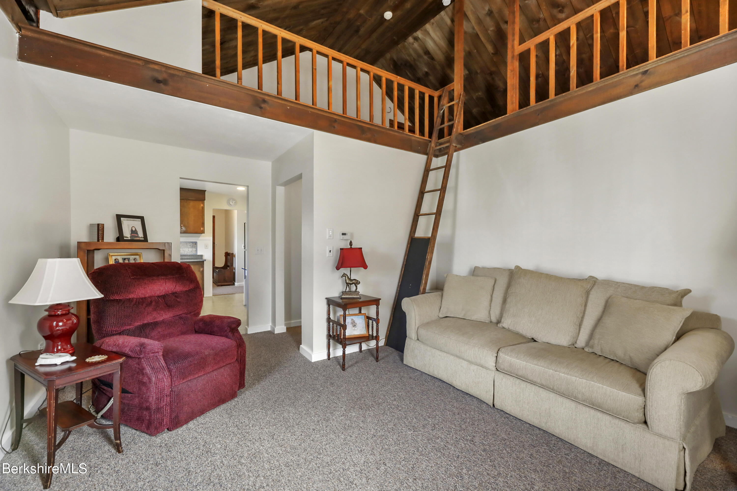 125 Center Street, Unit 2 Lee, MA 01238 - Photo 30 of 39 a living room with furniture and a couch