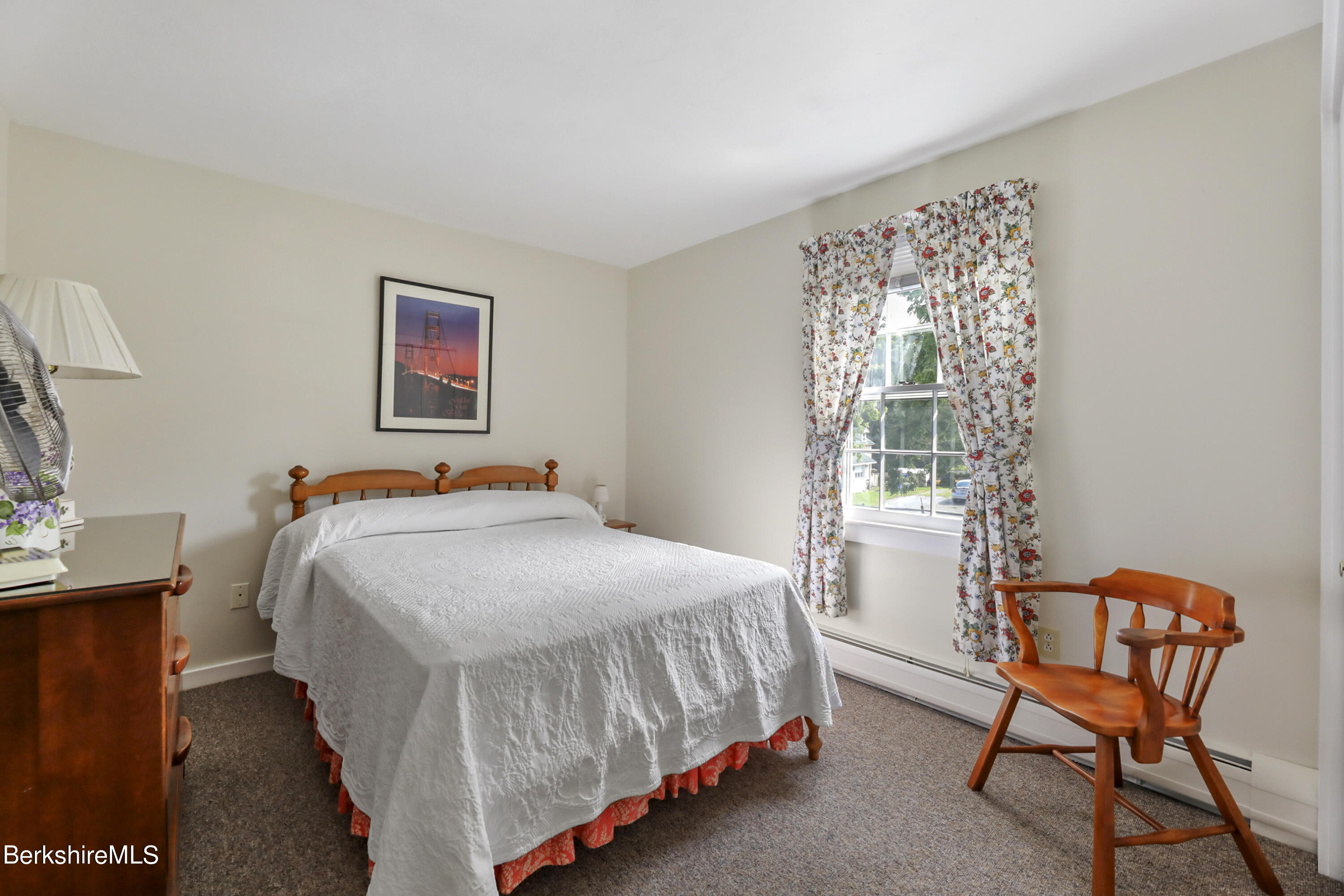 125 Center Street, Unit 2 Lee, MA 01238 - Photo 34 of 39 a bedroom with a bed and a window