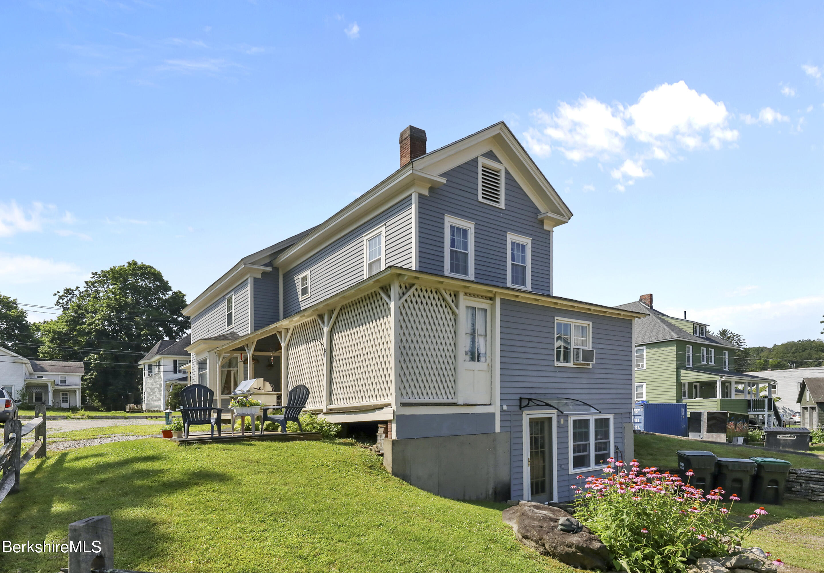 125 Center Street, Unit 2 Lee, MA 01238 - Photo 5 of 39 a front view of house with yard