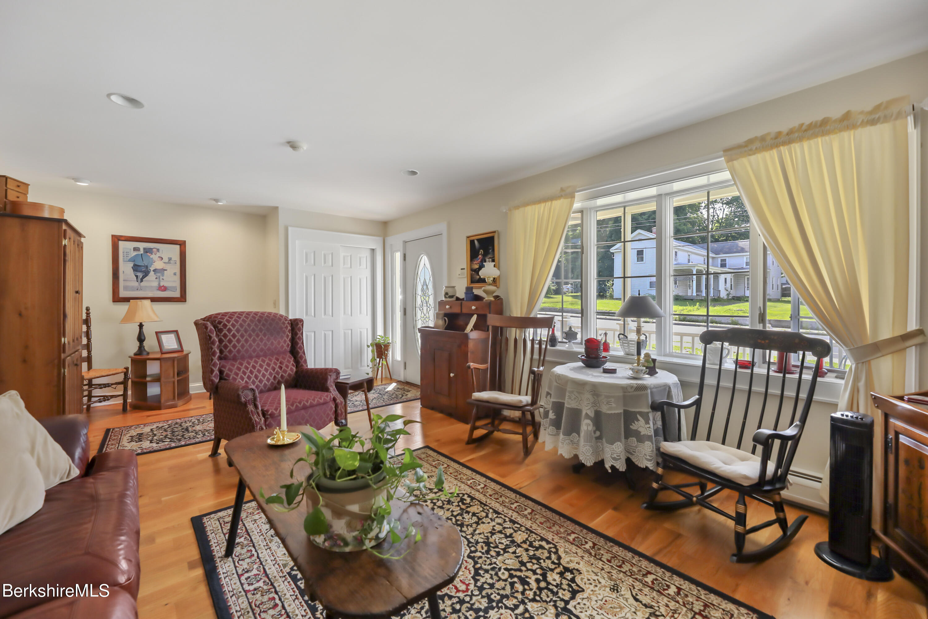 125 Center Street, Unit 2 Lee, MA 01238 - Photo 10 of 39 a living room with furniture and a window
