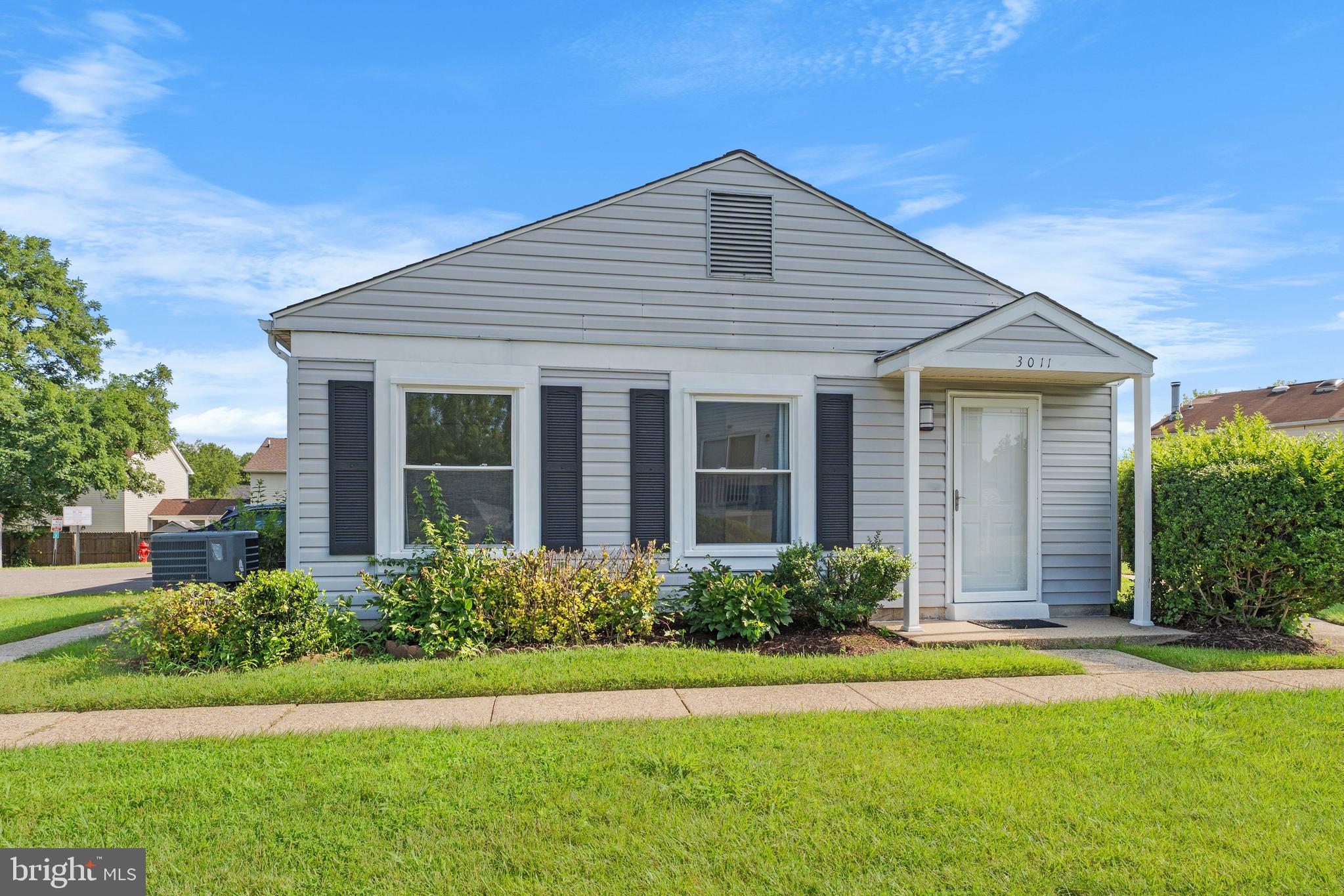 3011 Chester Grove Road, Unit A Upper Marlboro, MD 20774 - Photo 1 of 22 front view of a house and a yard