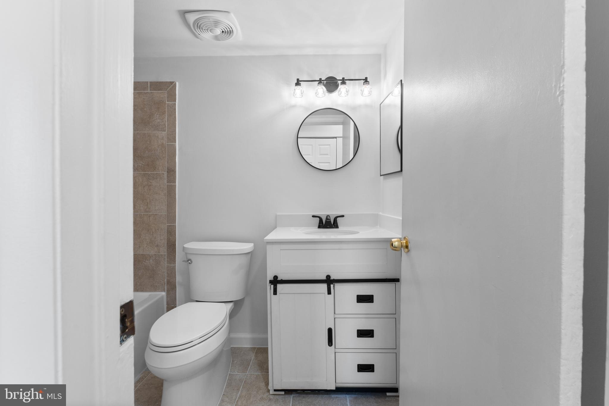 3011 Chester Grove Road, Unit A Upper Marlboro, MD 20774 - Photo 13 of 22 a bathroom with a sink and a toilet