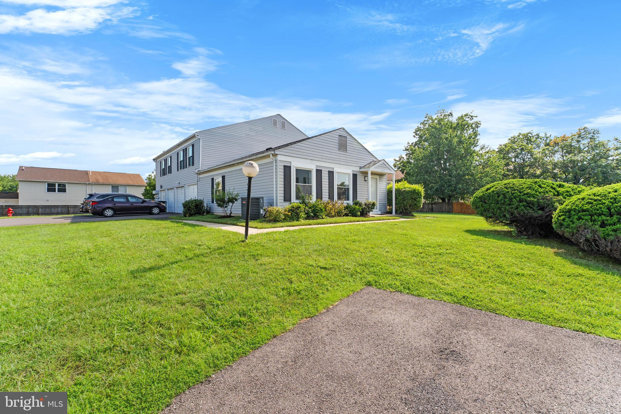 3011 Chester Grove Road, Unit A Upper Marlboro, MD 20774 - Photo 18 of 22 a view of a house with a big yard