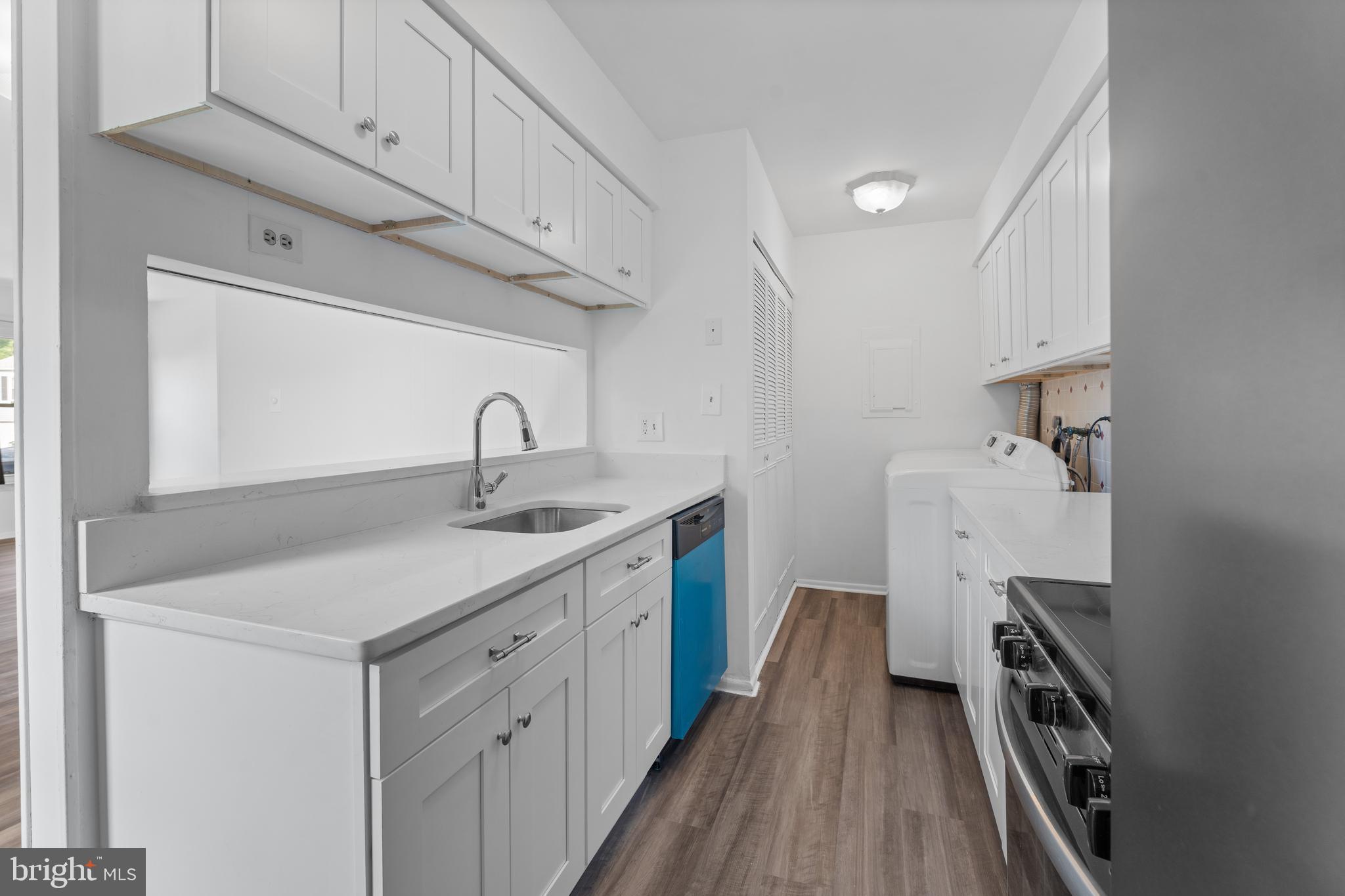 3011 Chester Grove Road, Unit A Upper Marlboro, MD 20774 - Photo 8 of 22 a kitchen with a sink and cabinets