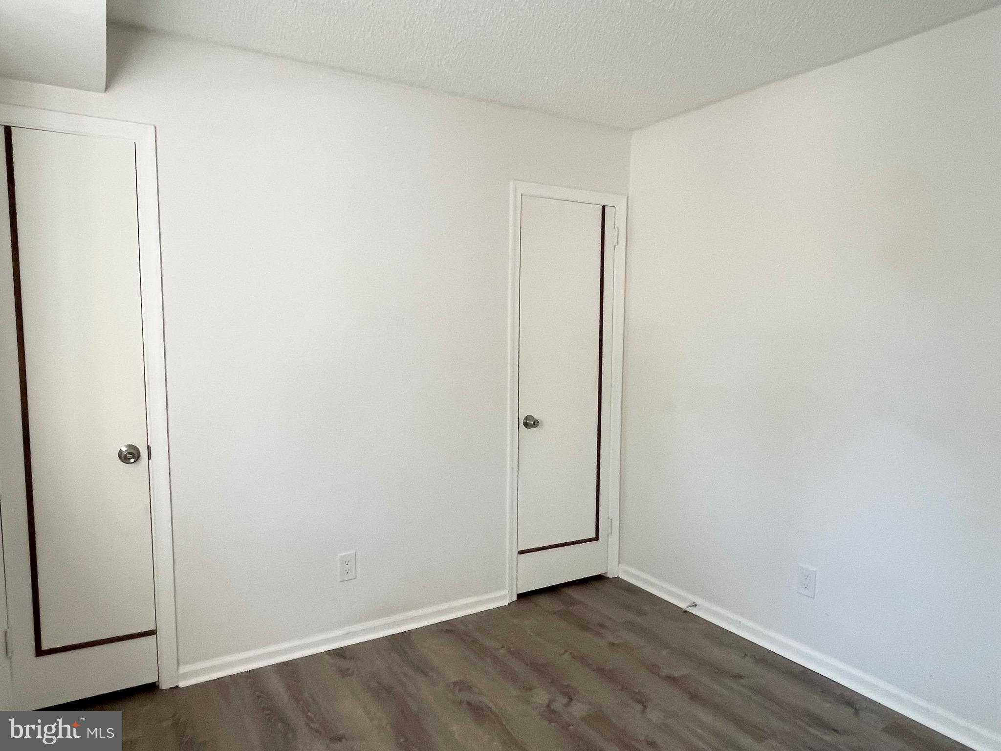50 Le Forge Court, Unit 50 Chesterbrook, PA 19087 - Photo 14 of 17 an empty room with wooden floor