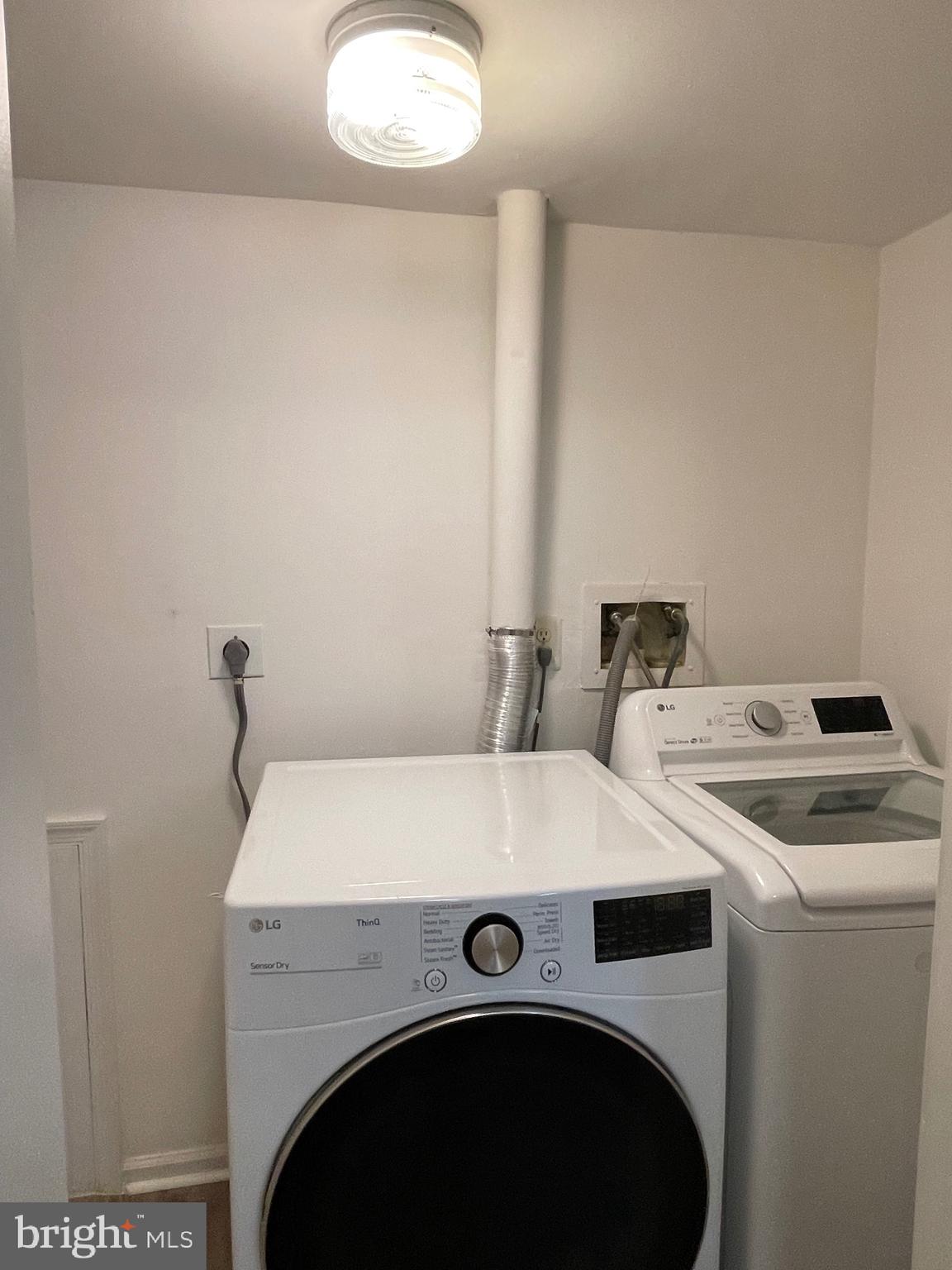 50 Le Forge Court, Unit 50 Chesterbrook, PA 19087 - Photo 6 of 17 a utility room with dryer and washer
