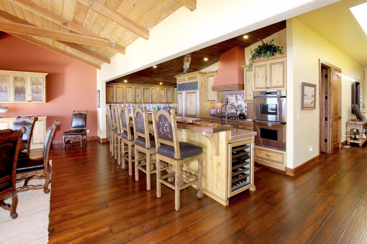 195 Vía Concha Aptos, CA 95003 - Photo 23 of 50 a view of a dining room with furniture wooden floor and chandelier