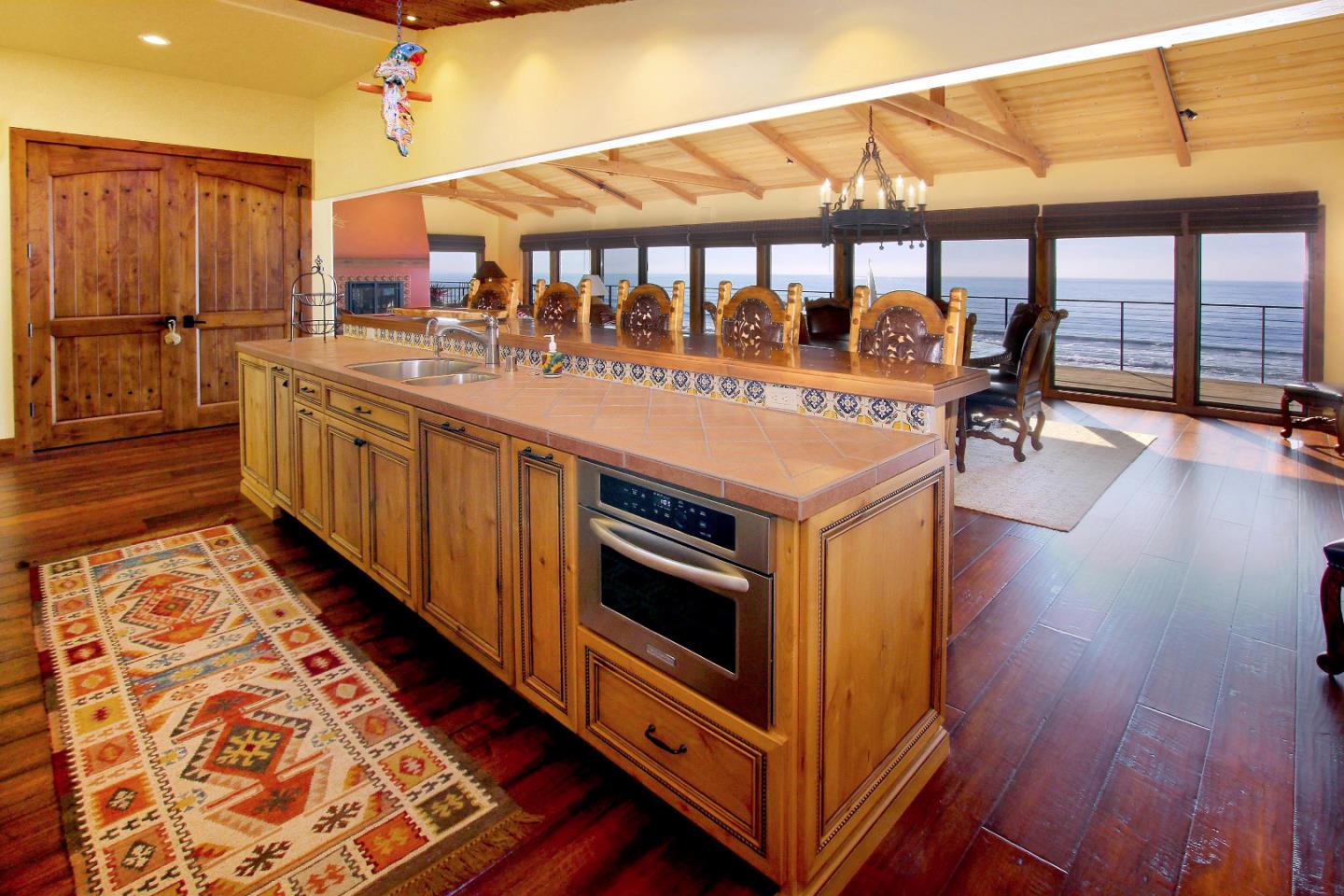 195 Vía Concha Aptos, CA 95003 - Photo 24 of 50 a kitchen with stainless steel appliances granite countertop a stove and a wooden floors